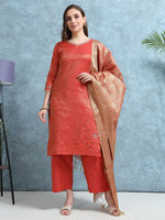Load image into Gallery viewer, Woman wearing a red kurta with a matching dupatta against a light blue wall.