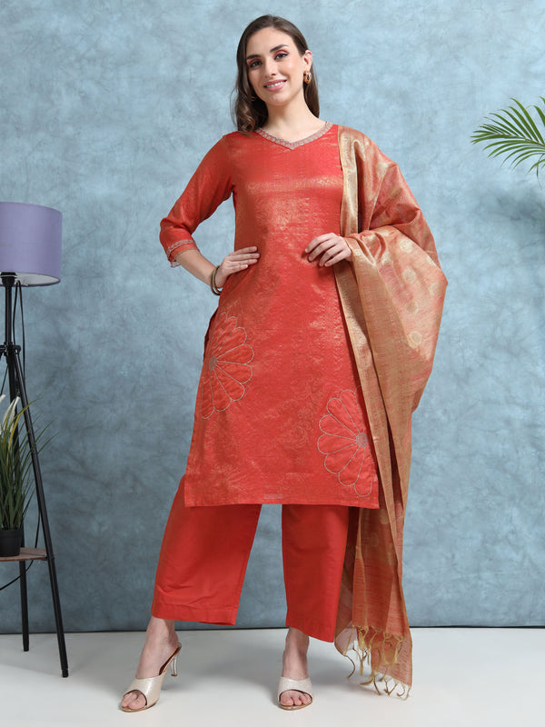 Woman wearing a red traditional outfit with a dupatta against a blue background